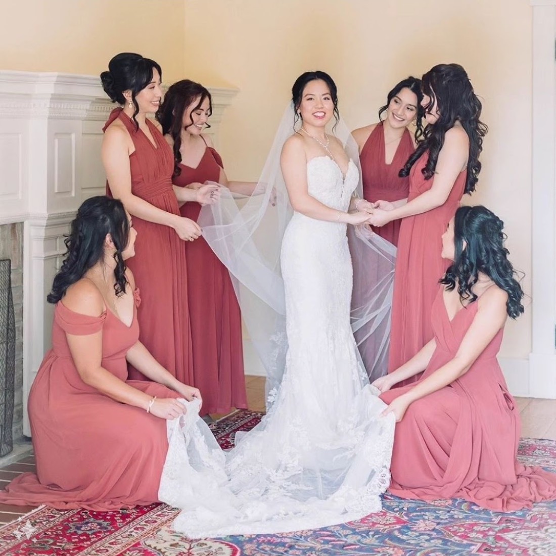 Bride and bridesmaids with finished hair and makeup